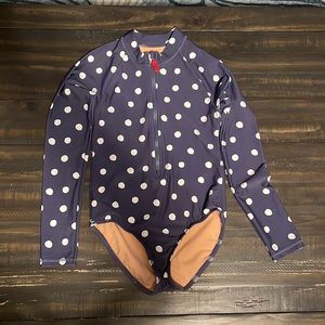 Crewcuts girls’ rash guard one-piece swimsuit.